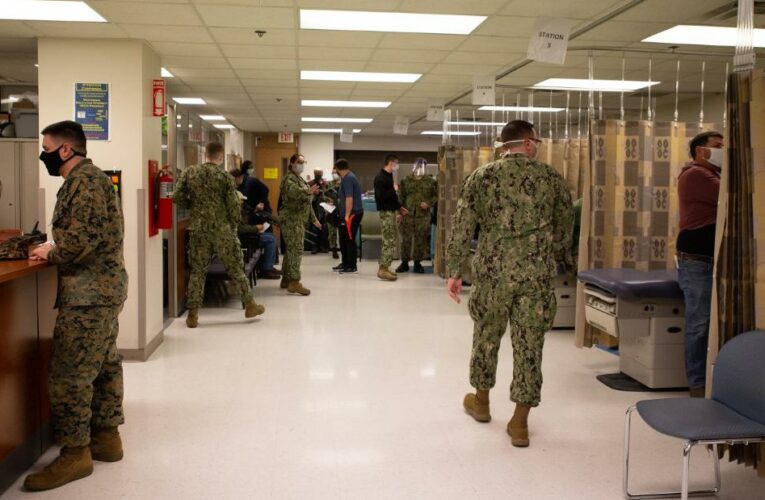 A Marine Corps spokeswoman says there are a number of potential reasons a Marine may choose not to receive a vaccine, including waiting until it becomes mandatory