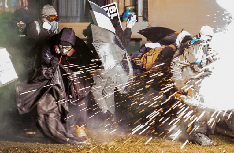 Police in a Minneapolis suburb used pepper spray and fired flash bombs at the crowds demonstrating over the death of Daunte Wright