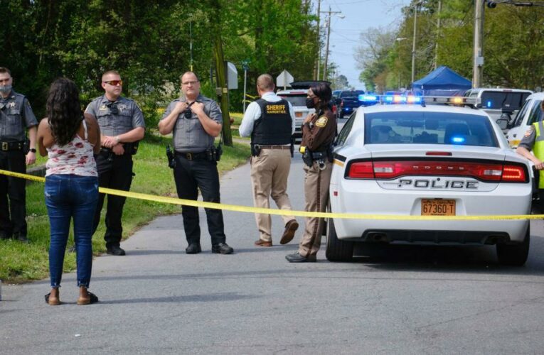 Neighbors detail a chaotic scene of deputies trying to serve a warrant, a car pulling away and shots fired — leaving one man dead