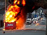Belfast rioters attack police, a photographer and hurl petrol bombs