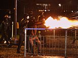 Youths hurl petrol bombs at police as violence breaks out AGAIN in Northern Ireland