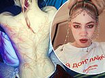 Elon Musk’s girlfriend Grimes shows off ‘beautiful alien scars’ newly inked across her back