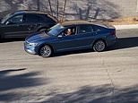 Woman struggles to parallel park and is helped by a Good Samaritan