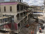 End of an iconic EYESORE: Bulldozers trample south London’s Elephant & Castle Shopping Centre