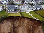 Families living near crumbling cliffs are urged to abandon homes before ANOTHER landslide