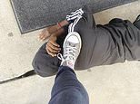 Teacher suspended after taking a photo with her foot on the neck of a black pupil, 11
