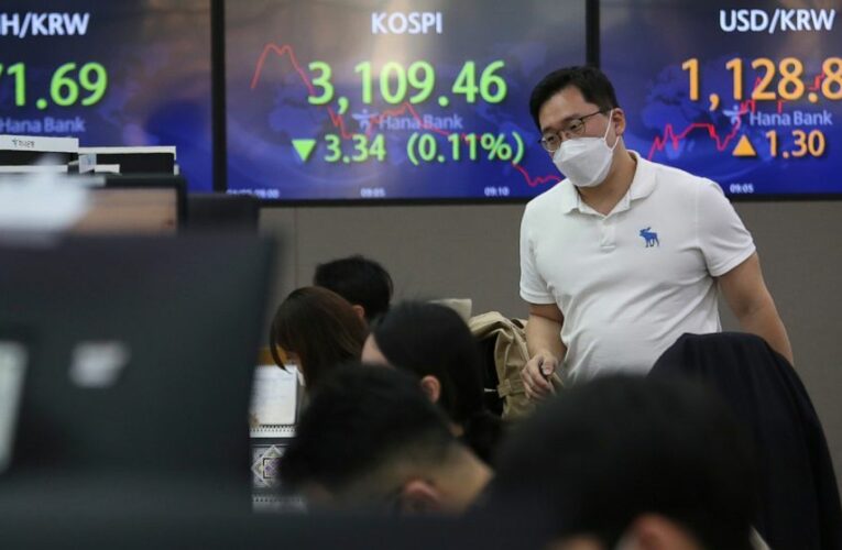 Asian mixed after Wall St. record amid vaccine optimism