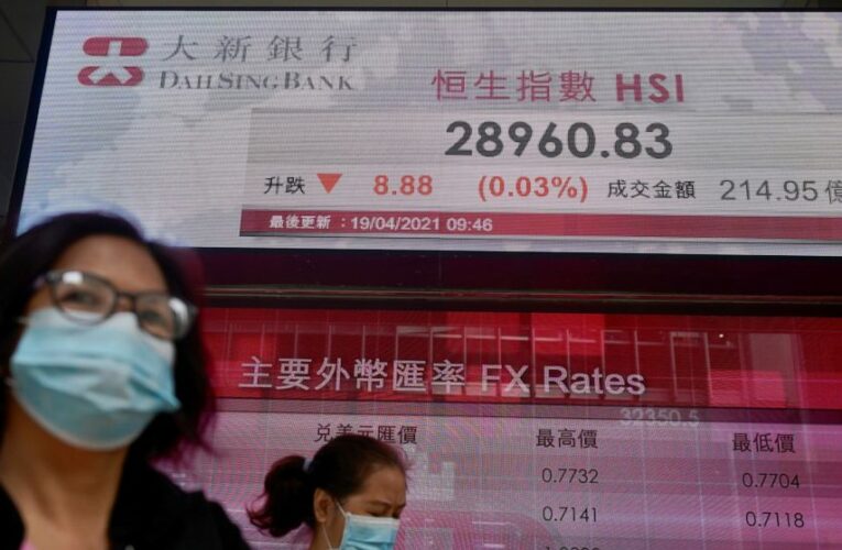 Asian shares rise amid cautious outlook for global economy