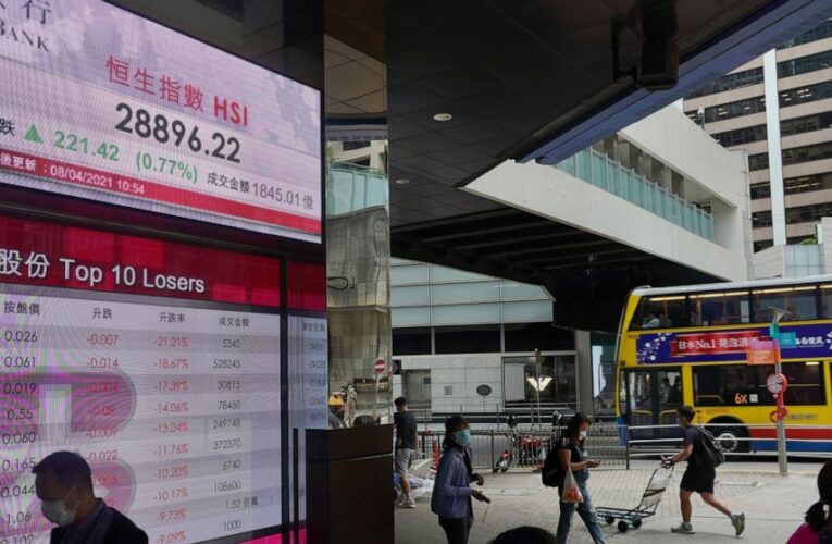 Asian shares mostly lower on strong China price data