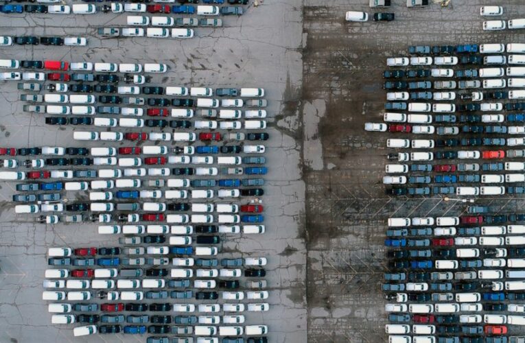 Chip shortage forces more production cuts by GM, Ford