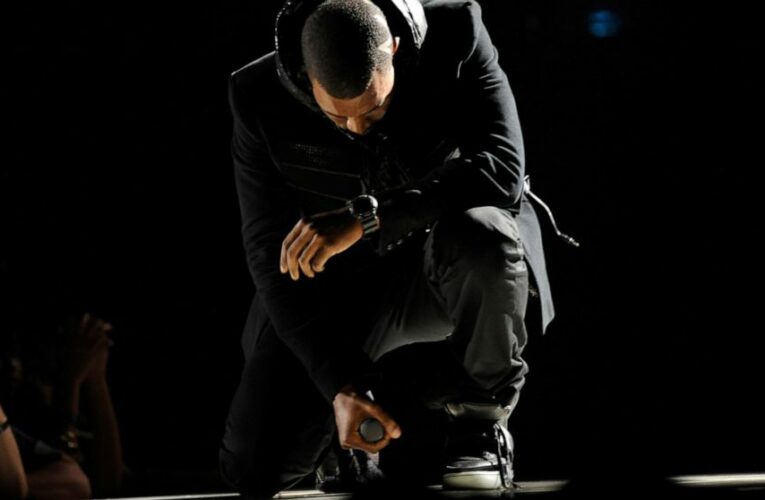 Kanye West sneakers fetch record $1.8 million at auction