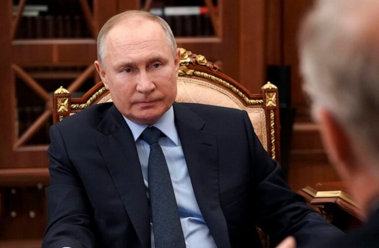 Putin signs law that allows him to serve two more terms