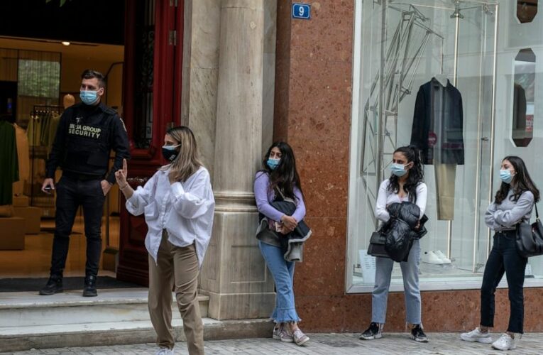 Stores in Greece open amid virus surge to help save economy