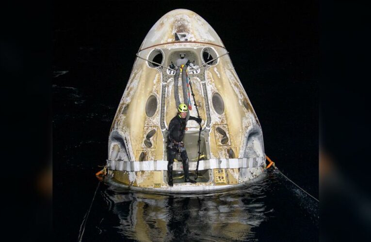 The SpaceX Crew Dragon capsule made a parachute landing in the Gulf of Mexico early Sunday, returning four astronauts from a record-setting space mission