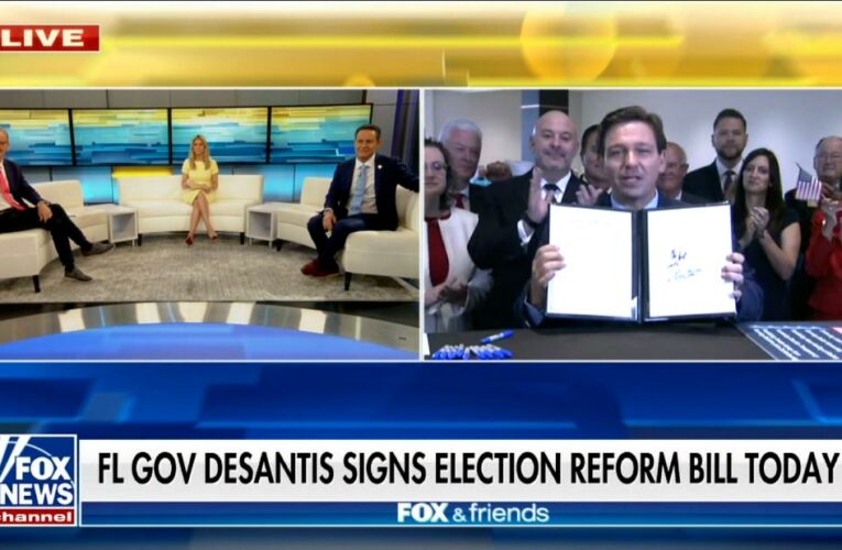 See DeSantis sign controversial law during Fox News broadcast