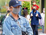 Chrissy Teigen attempts to keep a low profile at Disneyland amid explosive cyber-bullying scandal