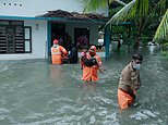 India sees cases officially drop below 300,000 a day but now country threatened by killer cyclone