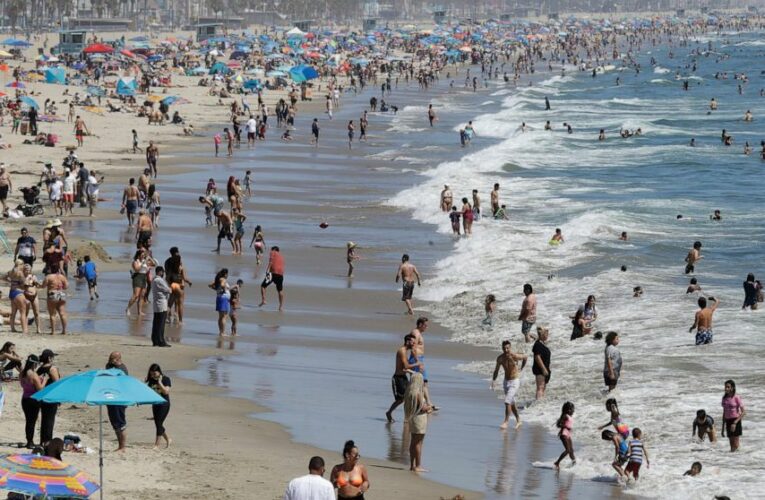 Californians hit beaches, travel ahead of virus rules easing