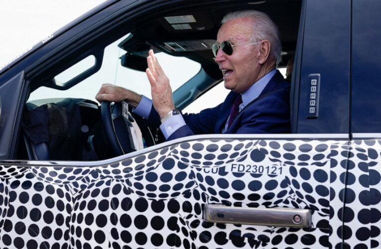 Biden back behind the wheel, zooming away in electric truck