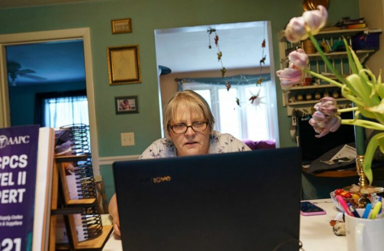 US jobless claims fall again as some states end federal aid