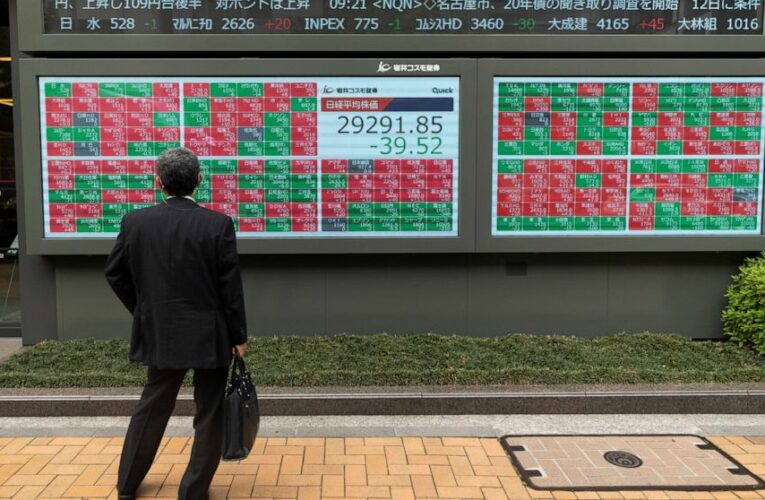 Stocks rally to records after grim jobs data undercuts rates