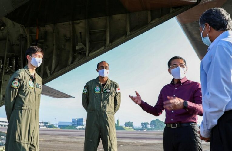 The Latest: New Mexico adopts CDC guidance on facemasks