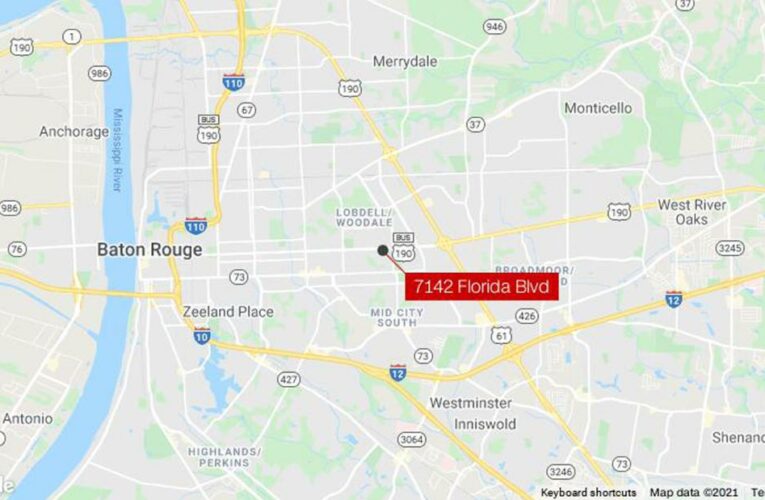 Police search for suspects in a shooting that left two people dead