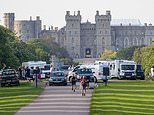 Travellers park up vehicles on Long Walk next to Windsor Castle