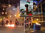 Minneapolis cops tear gas protesters who lit FIRES as workers dismantled George Floyd Square