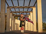 British piper plays at sunrise in Normandy… 77 years after Allied troops stormed beaches on D-Day