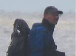 Pictured: man wanted by police after looter stripped WWII US Flying Fortress