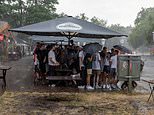 Devastated German fans are soaked as thunderstorms break out