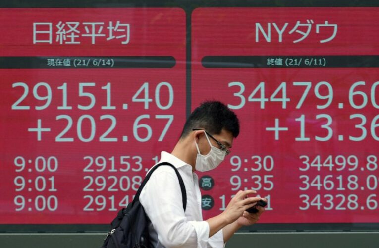 Stocks slip on Wall Street, pulling S&P 500 below record
