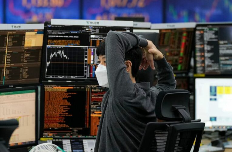 Asian shares mostly higher after listless session on Wall St