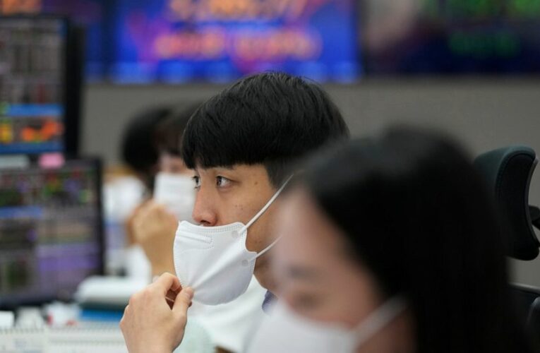 World shares mostly higher ahead of US price data