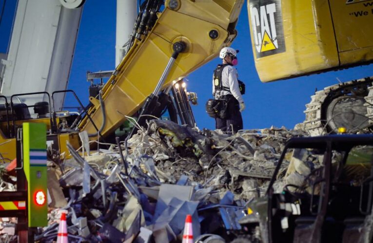 Rescue teams withstand wind, lightning and heat on 12-hour shifts to search for victims