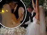 Gwen Stefani dances with her new husband Blake Shelton in snaps taken from their wedding day 