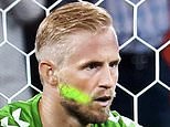 Calls for police probe after fan shone laser pen at Danish goalkeeper Kasper Schmeichel’s face