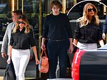 Barron Trump, 16, towers over his mother Melania as the mother-son duo leave Trump Tower