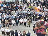 Rescue teams hold tearful moment of silence for victims of the collapsed Surfside condo