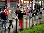 Moment man armed with 12 inch knife threatens England fans who hold up chairs to defend themselves