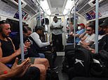 The Great Unmasking? Commuters ride the Tubes WITHOUT face-coverings