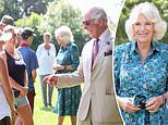 Prince Charles cracks a joke during a visit to a school after Harry’s book deal announcement