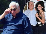 Amy Winehouse’s father Mitch is left in tears as he and the singer’s family visit her grave