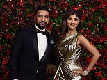 Bollywood actress Shilpa Shetty gives a statement to Indian police as they investigate her husband