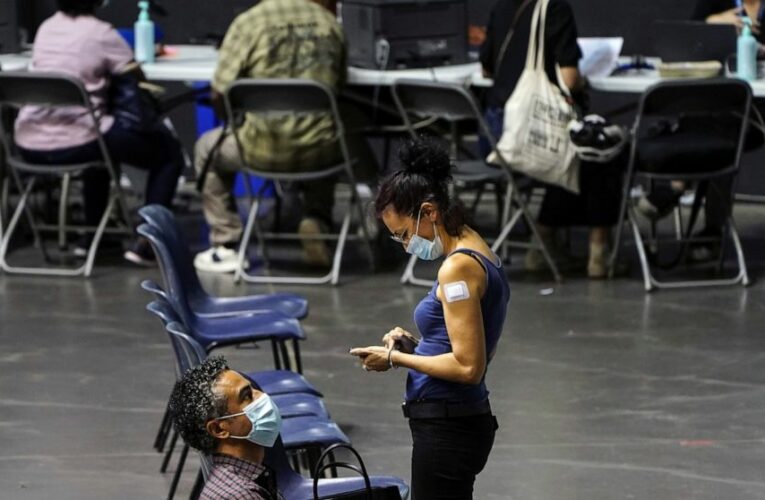 France’s Macron orders all health workers to get vaccinated