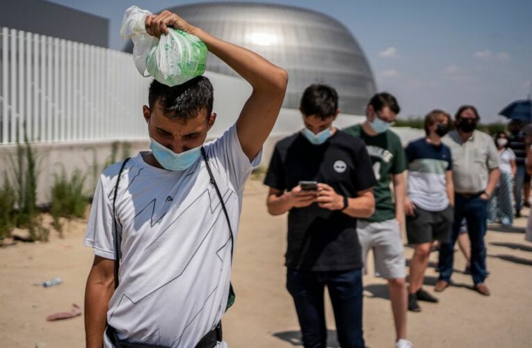 Spaniards put faith in COVID-19 vaccines even as cases surge