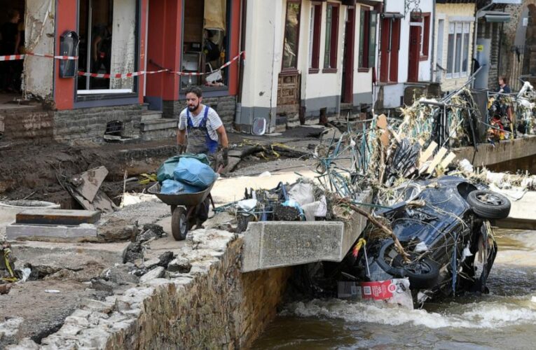 Merkel tours ‘surreal’ flood scene, vows aid, climate action
