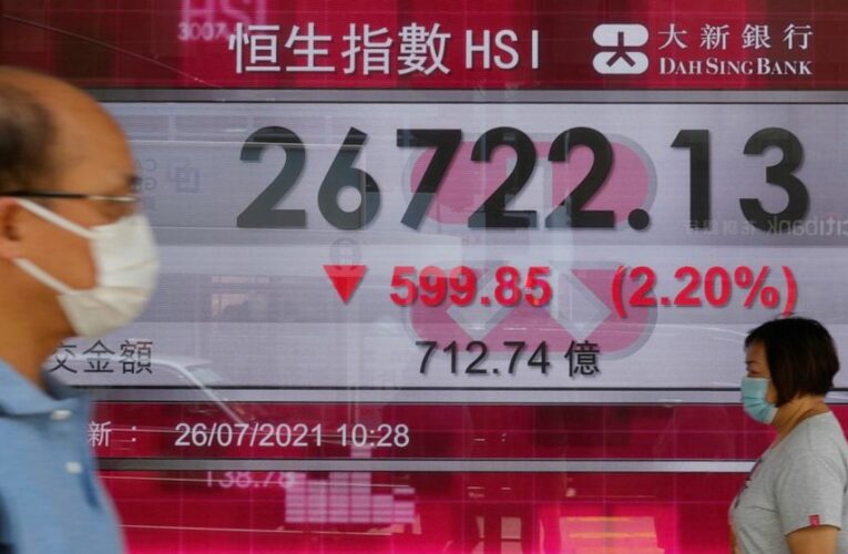 Stocks shake off a wobbly start and finish slightly higher