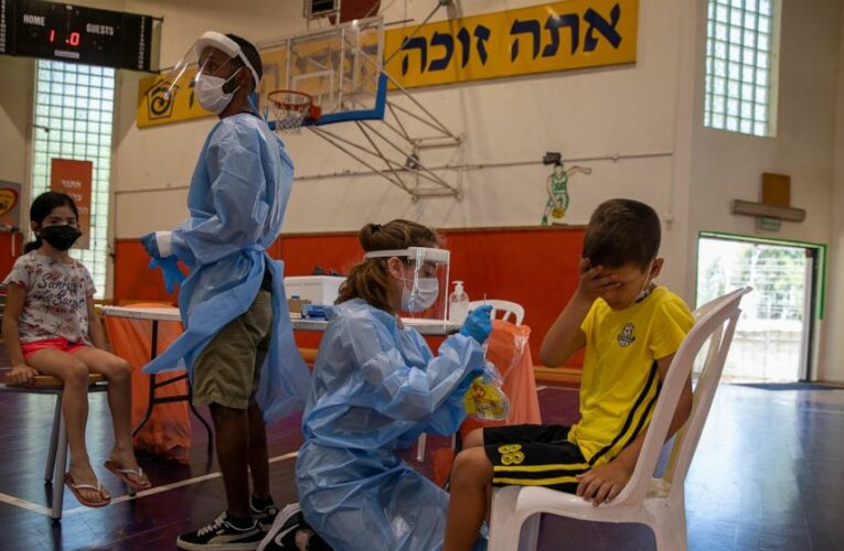 The Latest: Israel strikes Pfizer deal for new vaccine batch